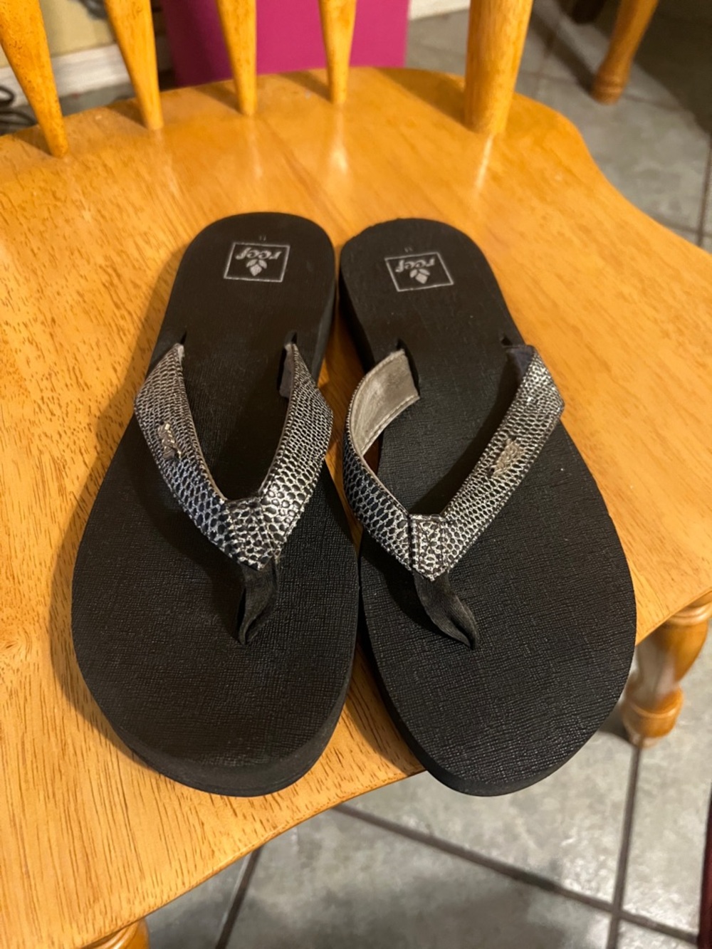 Reef Black Flip Flops with Silver Textured Straps